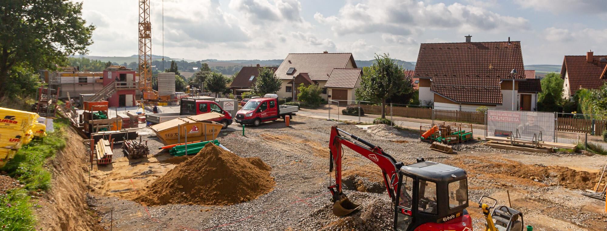 Schlüsselfertiger Wohnungsbau | 3 Mehrfamilienhäuser KfW 55